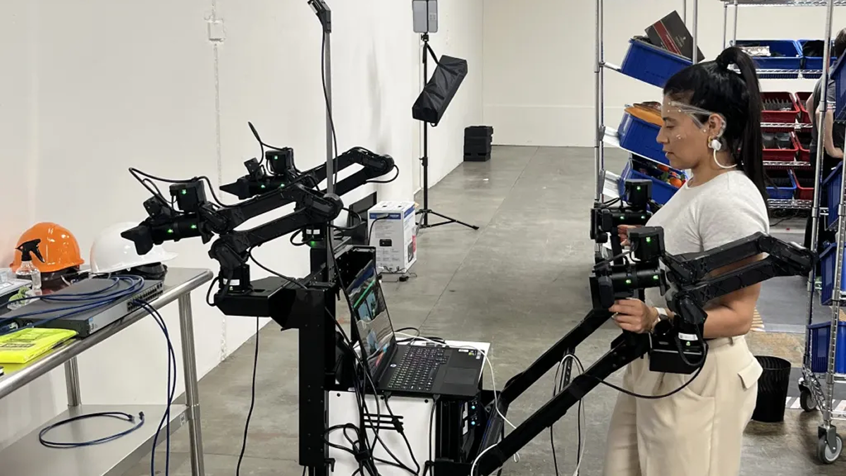 A person wearing an EEG headset while first-person video and brain-wave signals are captured for physical AI training.